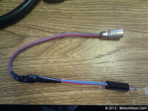 Complete Tally cable assembly from a 3.5mm mono connector through an opto-isolator (wrapped in electrical tape to a re-enforcing wire) into a Hirose 4-pin connector for connection to a Panasonic camcorder.