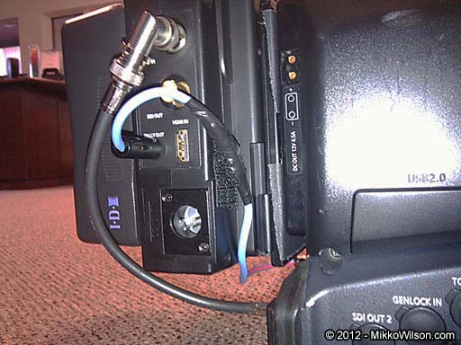 Cable from the 'Tally Out' connector on the Switronix Recon Transmitter secured with Velcro.